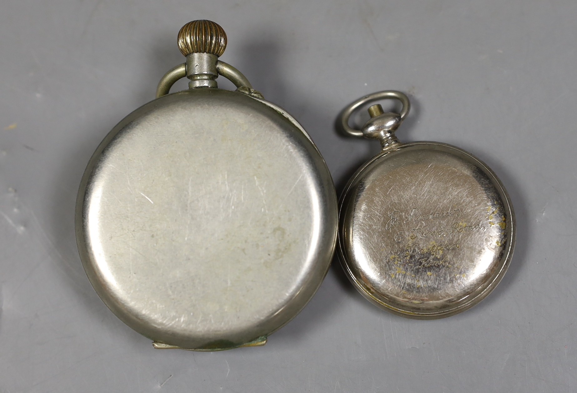 A nickel cased goliath pocket watch and a chrome cased mileometer watch.